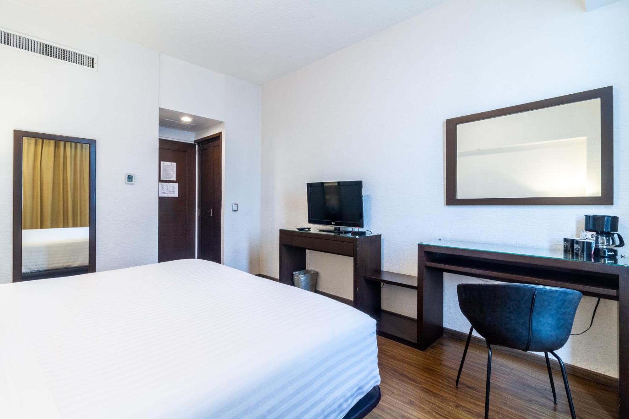 Meson Ejecutivo Guadalajara Minerva - Av Mexico Hotel ภายนอก รูปภาพ