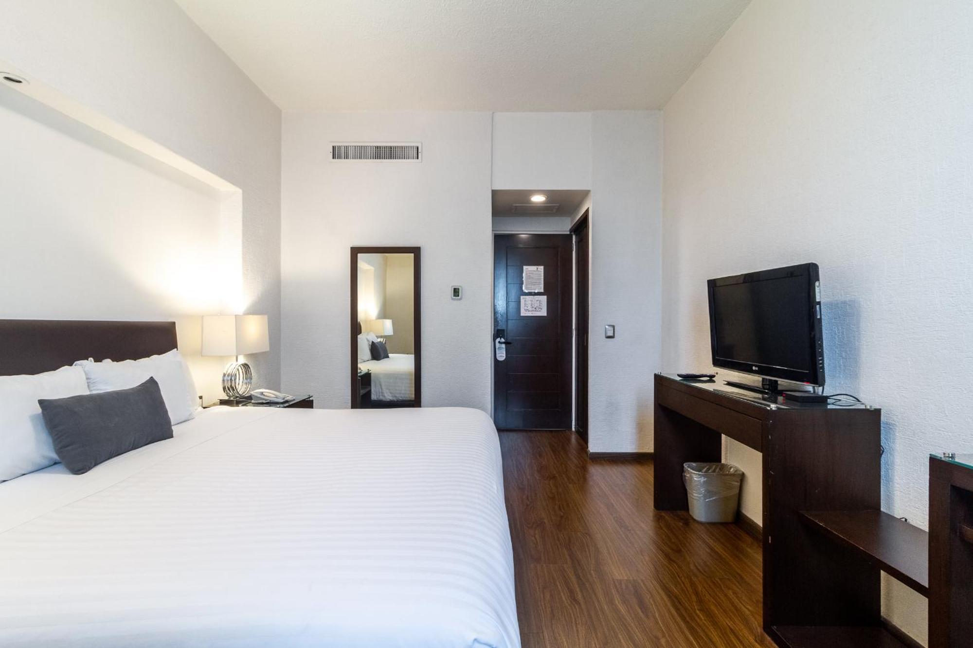 Meson Ejecutivo Guadalajara Minerva - Av Mexico Hotel ภายนอก รูปภาพ