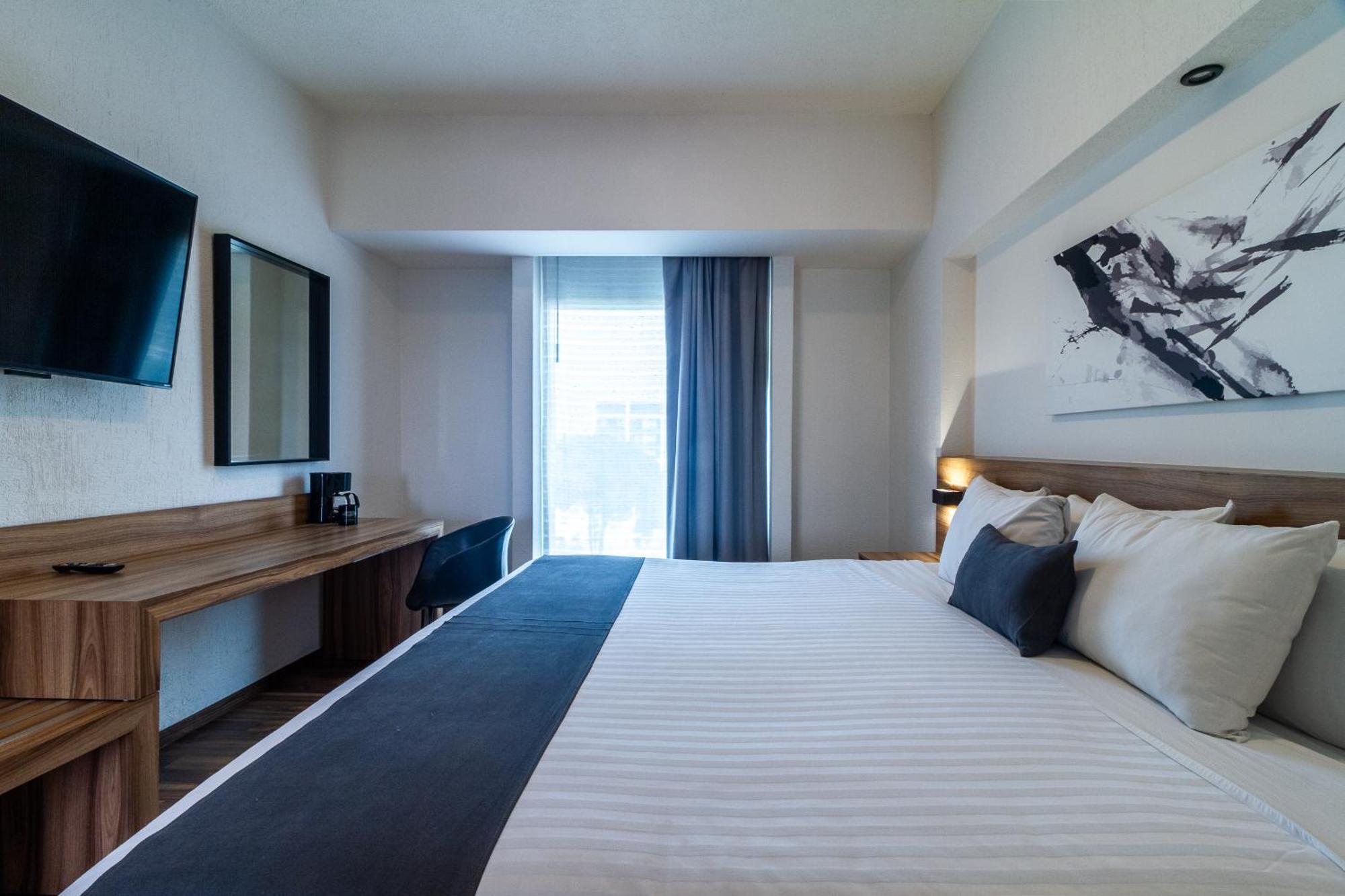 Meson Ejecutivo Guadalajara Minerva - Av Mexico Hotel ภายนอก รูปภาพ