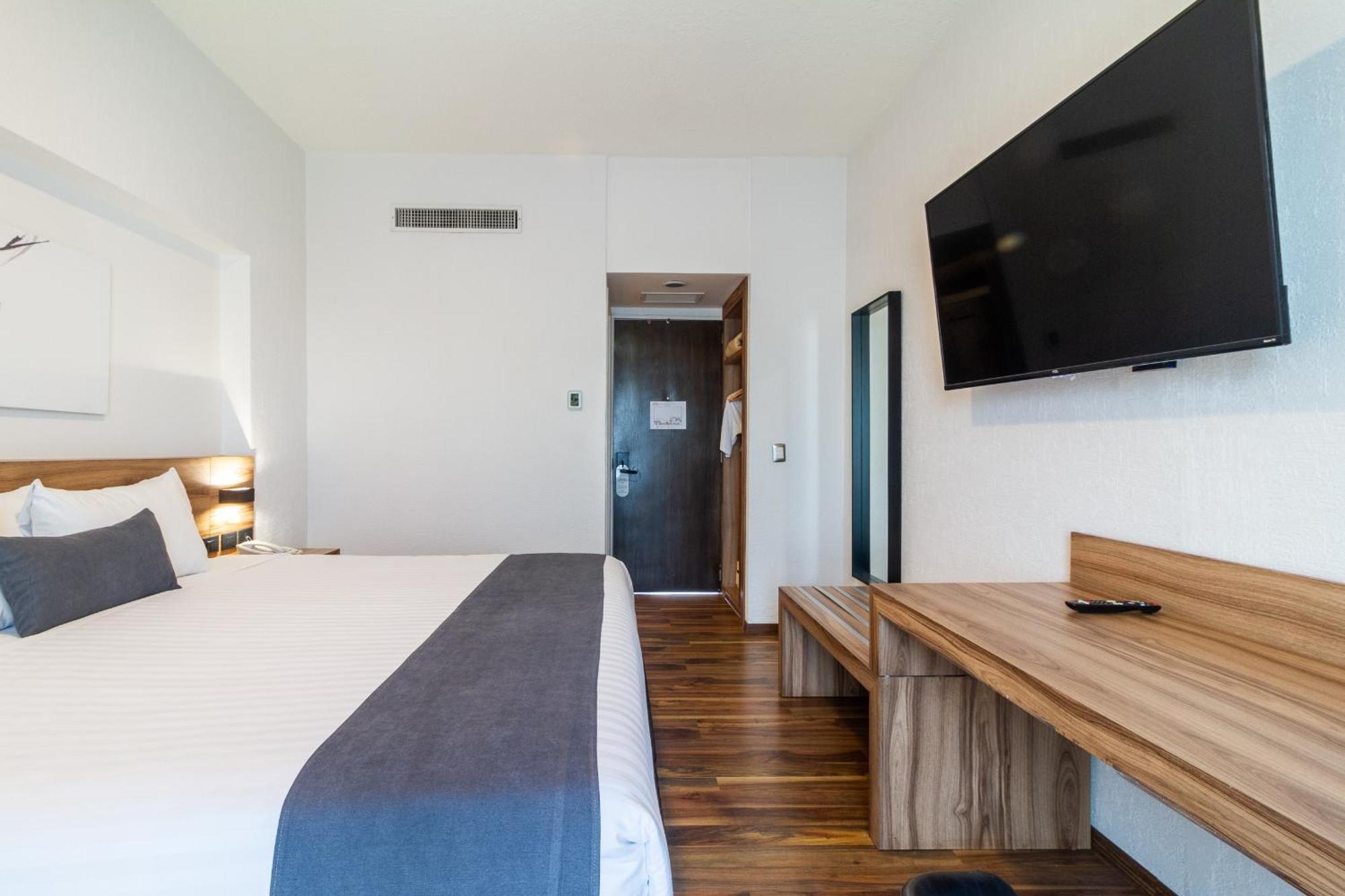 Meson Ejecutivo Guadalajara Minerva - Av Mexico Hotel ภายนอก รูปภาพ